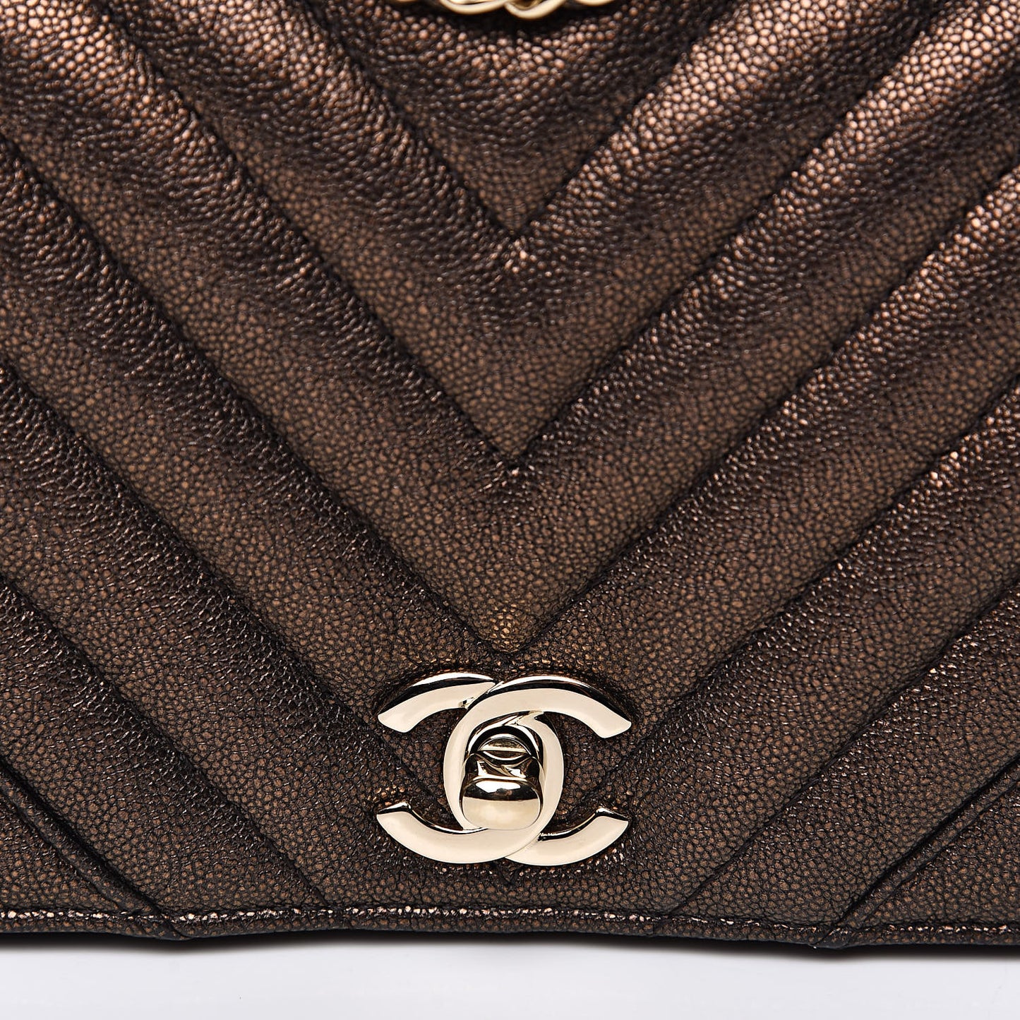 Metallic Caviar Chevron Quilted Mini Statement Flap Bronze
