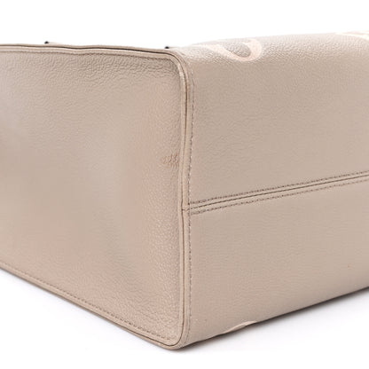 Louis Vuitton Empreinte Monogram Giant Onthego MM Tourterelle Creme 8 of 10