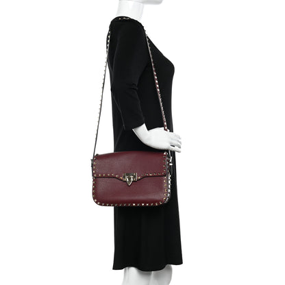 Valentino Garavani Pebbled Calfskin Medium Rockstud Flap Saddle Bag Rubino 2 of 10