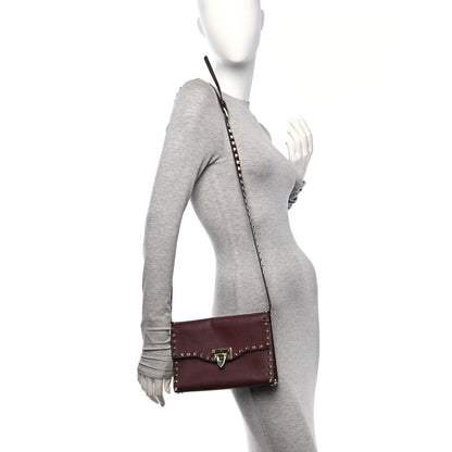 Valentino Garavani Pebbled Calfskin Medium Rockstud Flip Lock Crossbody Bag Rubin 2 of 9