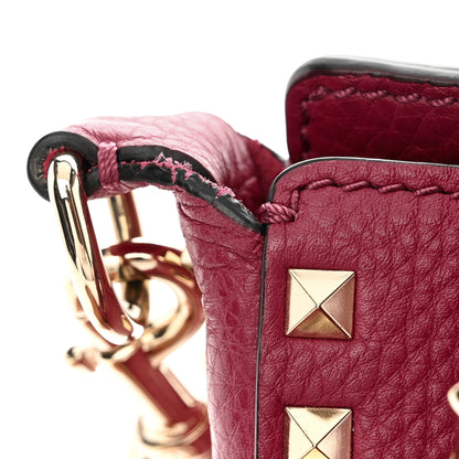Valentino Garavani Pebbled Calfskin Mini Rockstud Flip-Lock Messenger Bag Raspberry 8 of 8