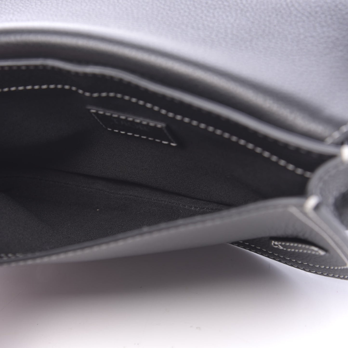 X KAWS Grained Calfskin Saddle Pouch Black