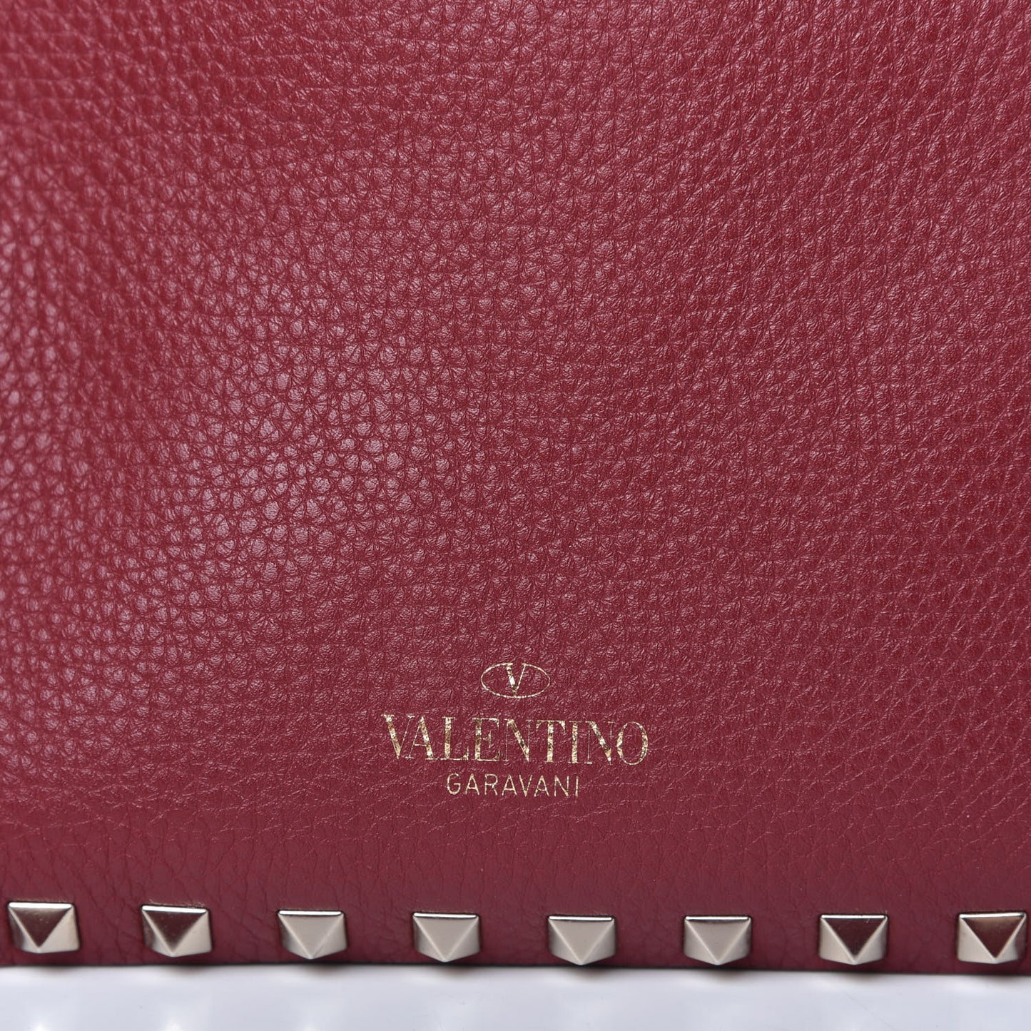 Pebbled Calfskin Mini Rockstud Flip-Lock Messenger Bag Rubino