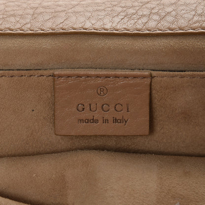 Gucci Pebbled Calfskin 1973 Clutch Beige 7 of 10