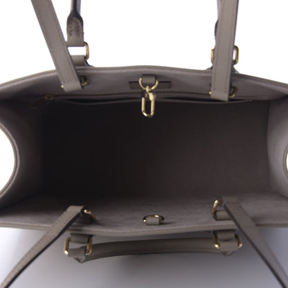 Louis Vuitton Empreinte Monogram Giant Onthego MM Tourterelle Creme 6 of 10