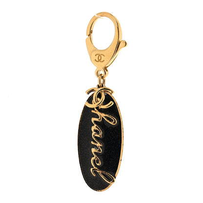 Chanel Metal Resin CC Logo Bag Charm Gold Pearly Black 1 of 4