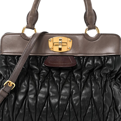 Miu Miu Nappa Matelasse Turnlock Hobo Black Brown 7 of 12
