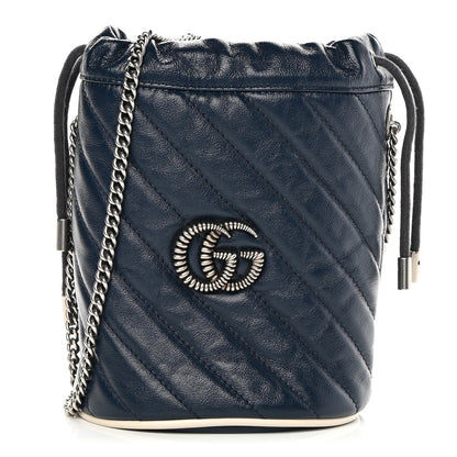 Gucci Vintage Effect Calfskin Matelasse Diagonal Mini Torchon GG Marmont 2.0 Bucket Bag Blue Agata Mystic White 1 of 12