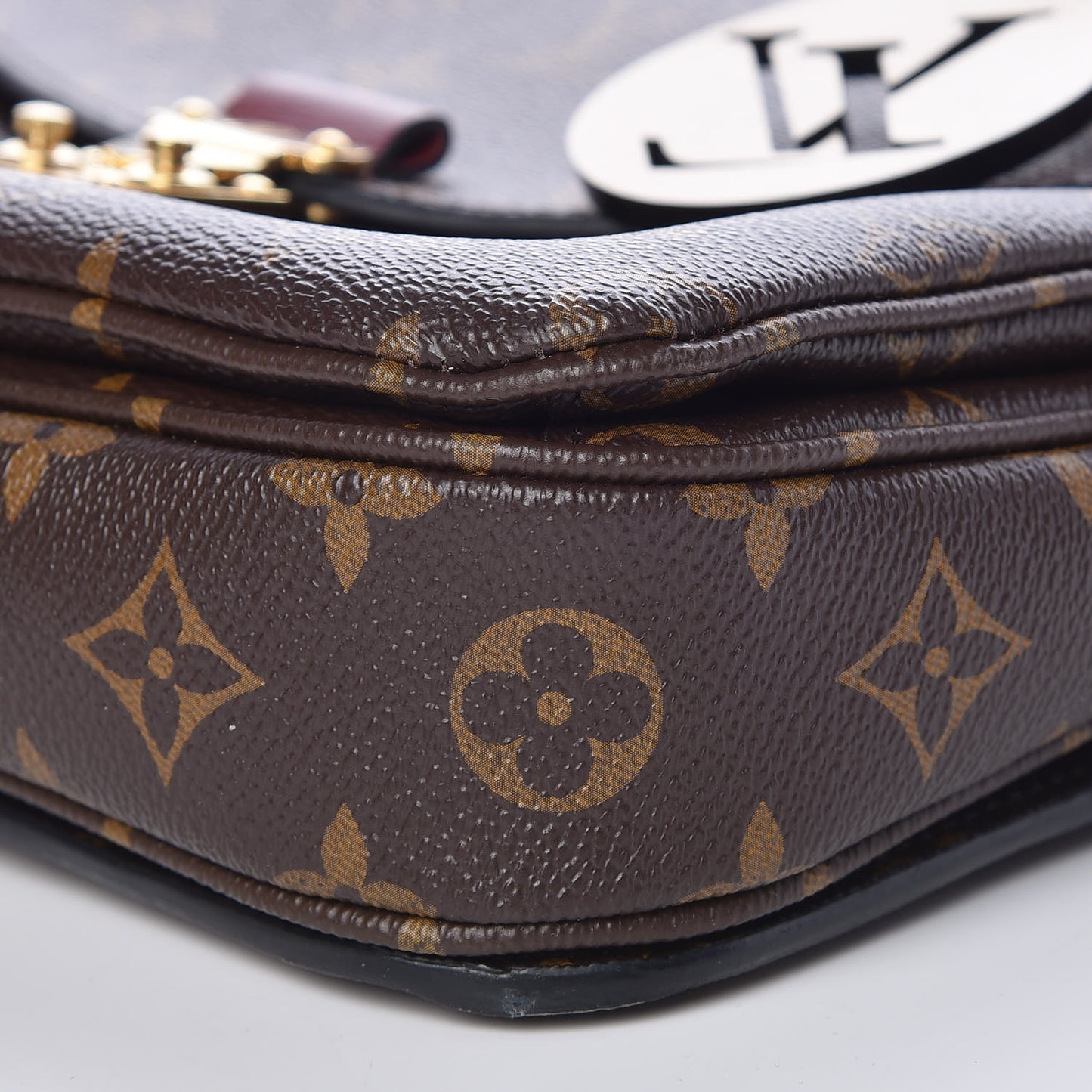 Monogram Braided Pochette Metis Safran
