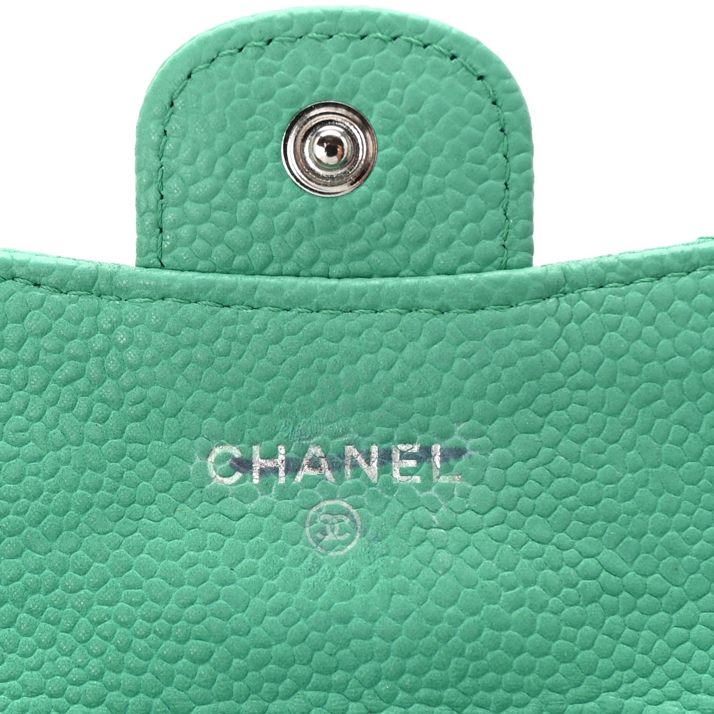 Iridescent Caviar Quilted Flap Zip Card Holder Green