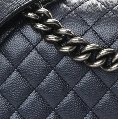 close up image of chanel quilted metallic cavair leather FASHIONPHILE