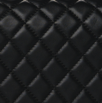 close up image of plain chanel quilted calfskin leather FASHIONPHILE