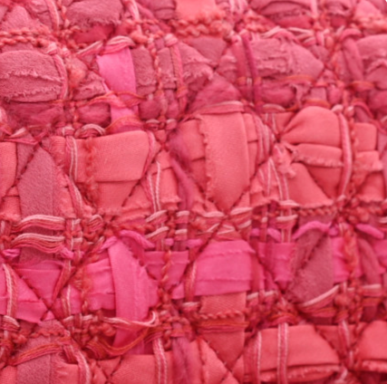 close up image of chanel tweed FASHIONPHILE