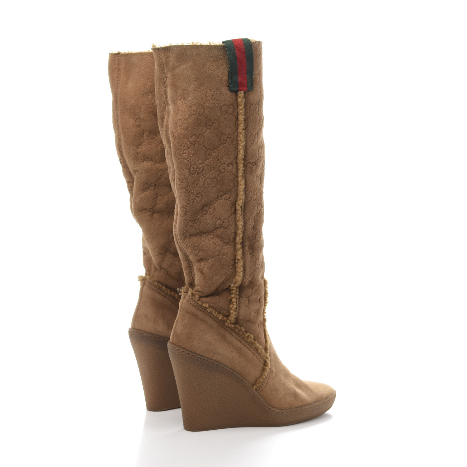 white gucci boots with fur
