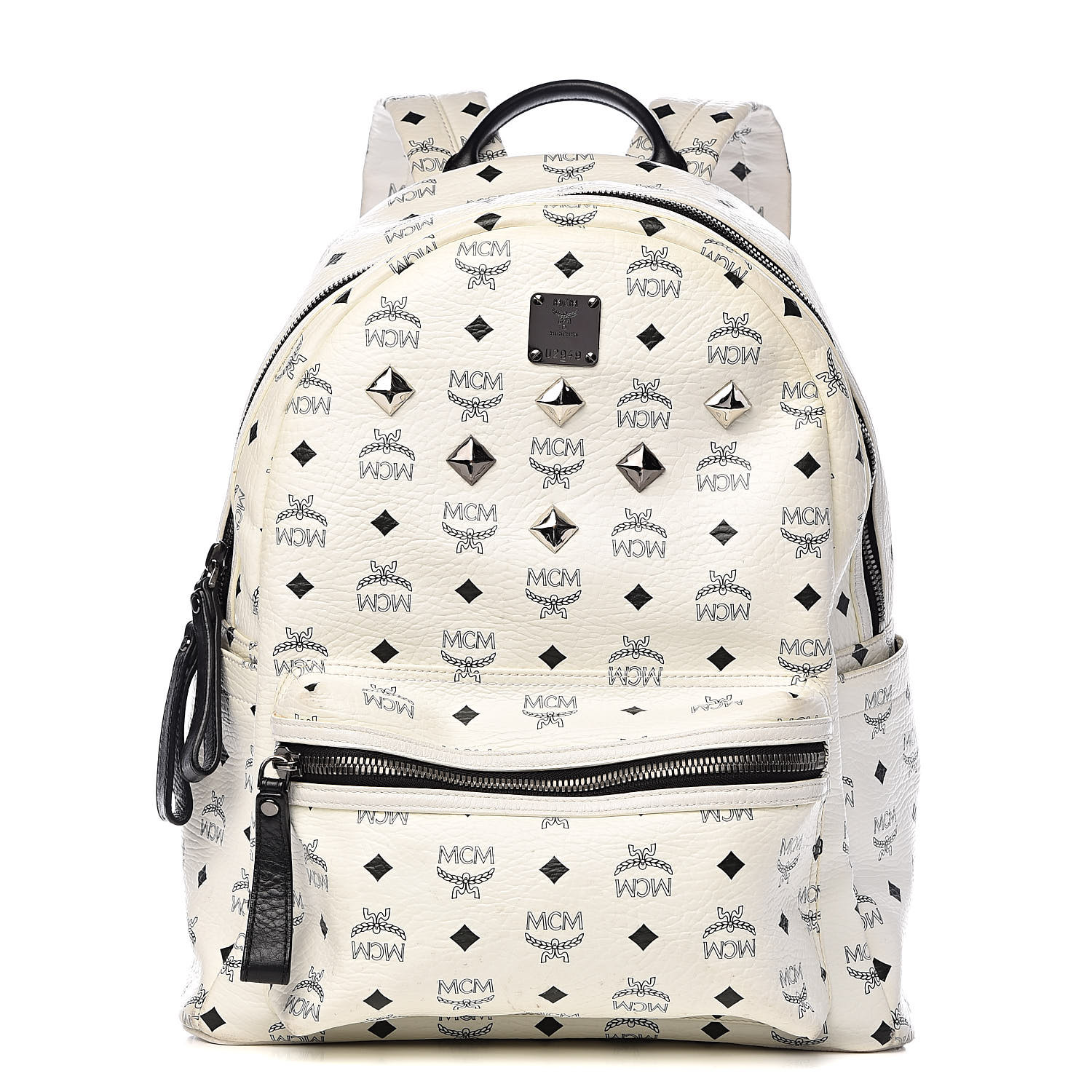 white mcm bag with patches