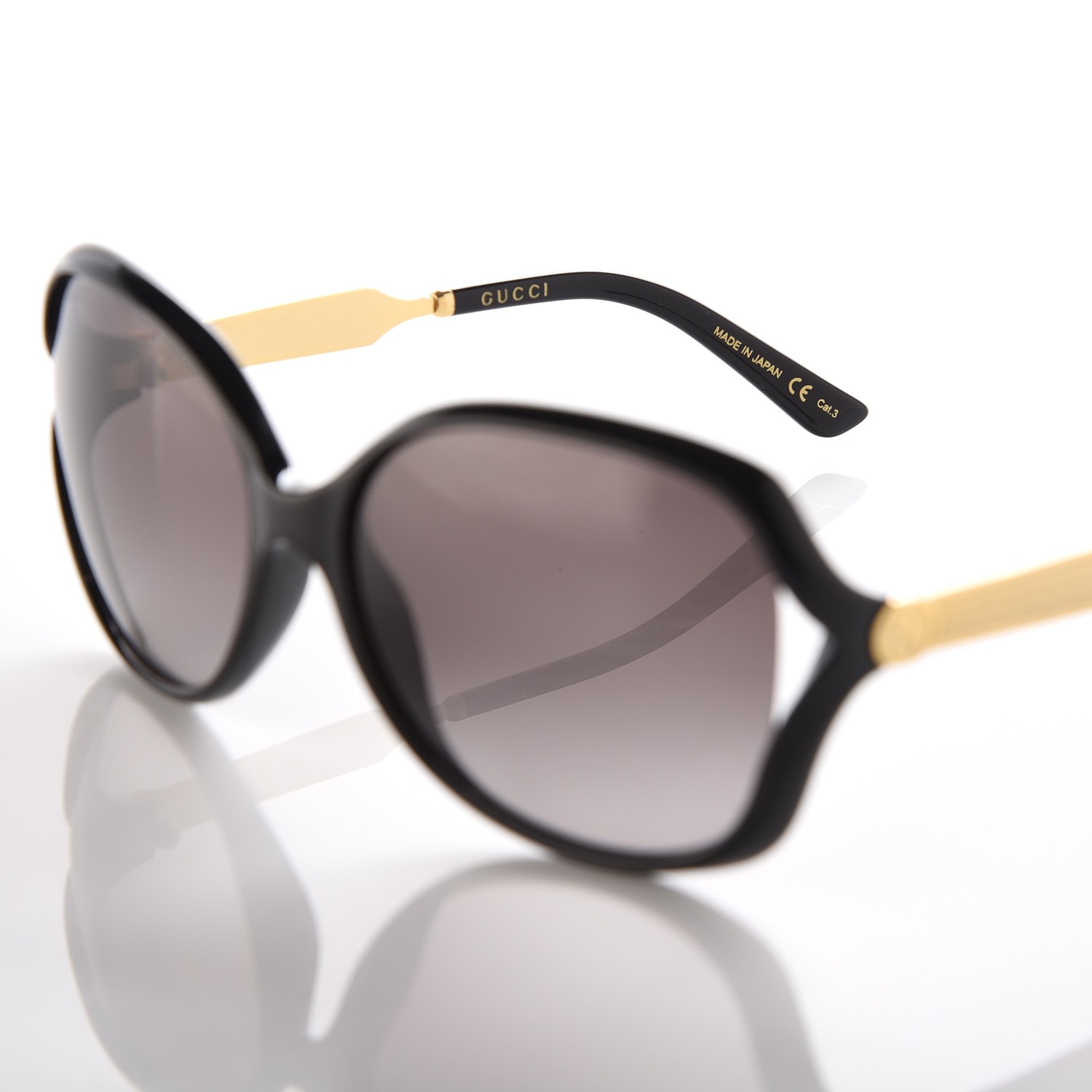 gucci shades with butterfly in the middle