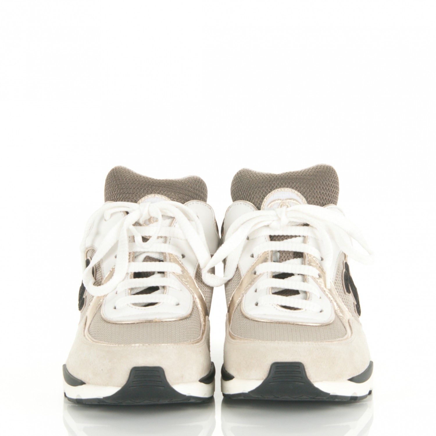 black and beige sneakers