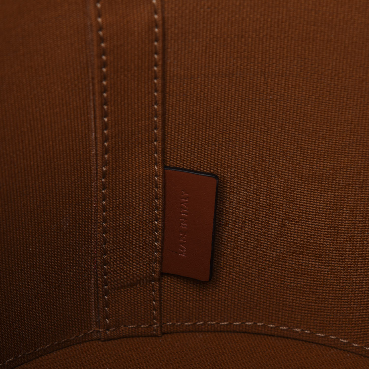 medium bucket in triomphe canvas and calfskin tan