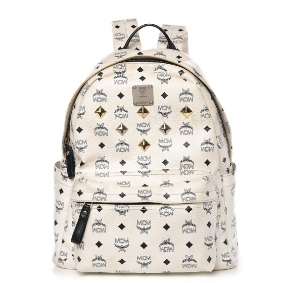 white mcm bag with patches