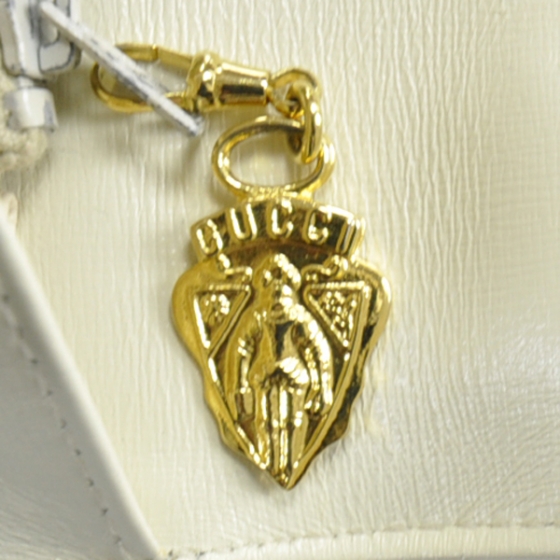 gucci 1827 s gold and white