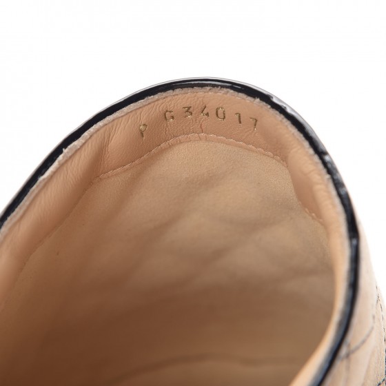 beige quilted mules
